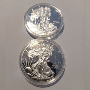 4-- one ounce silver Clad coins